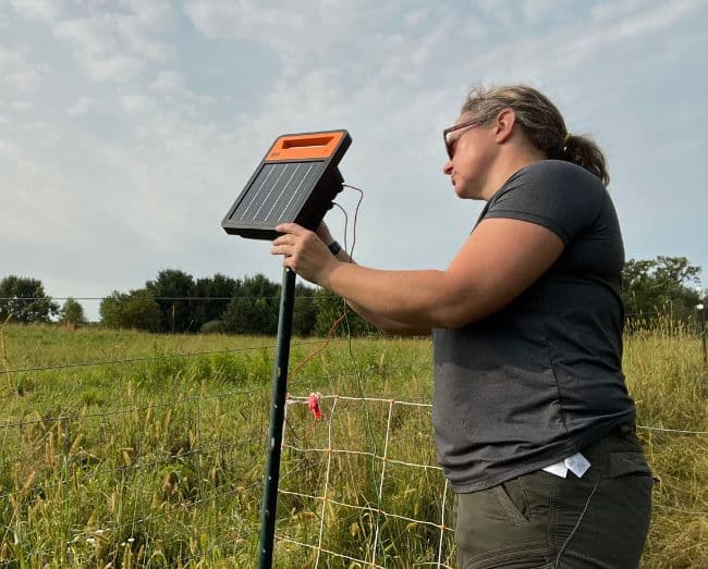 farmer setting up s80 solar energizer